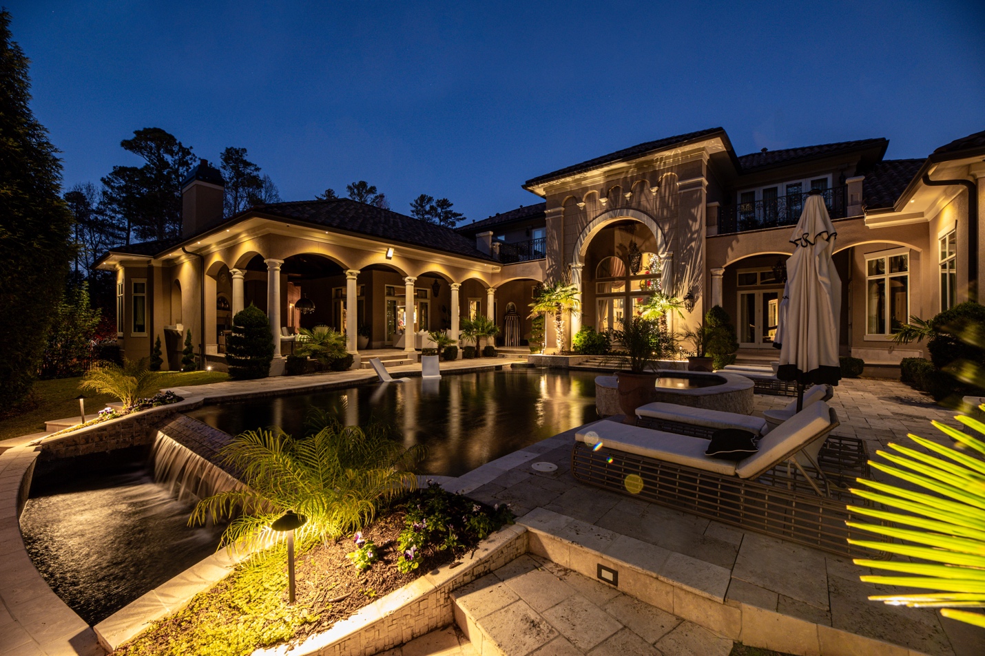 A pool in front of a house